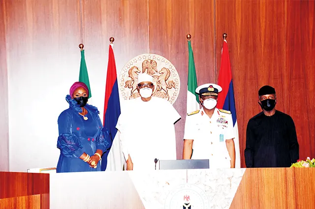 His Excellency, President Muhammadu Buhari, GCFR in a group photograph with the NOWA National President, Hajiya Nana Aisha Gambo and His Excellency, Professor Yemi Osinbajo, SAN GCON after the inauguration of Vice Admiral AZ Gambo (Admiralty Medal)