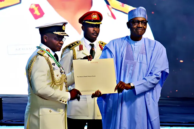 His Excellency, President Muhammadu Buhari GCFR presenting the certificate of confirmation for the award of the Commander of the Order of Federal Republic [CFR] to the Chief of the Naval Staff, Vice Admiral AZ Gambo