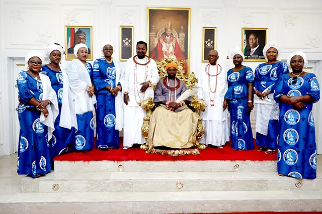 The Olu of Warri, His chiefs, NOWA National President and other NOWA members in a group photograph to commemorate the visit